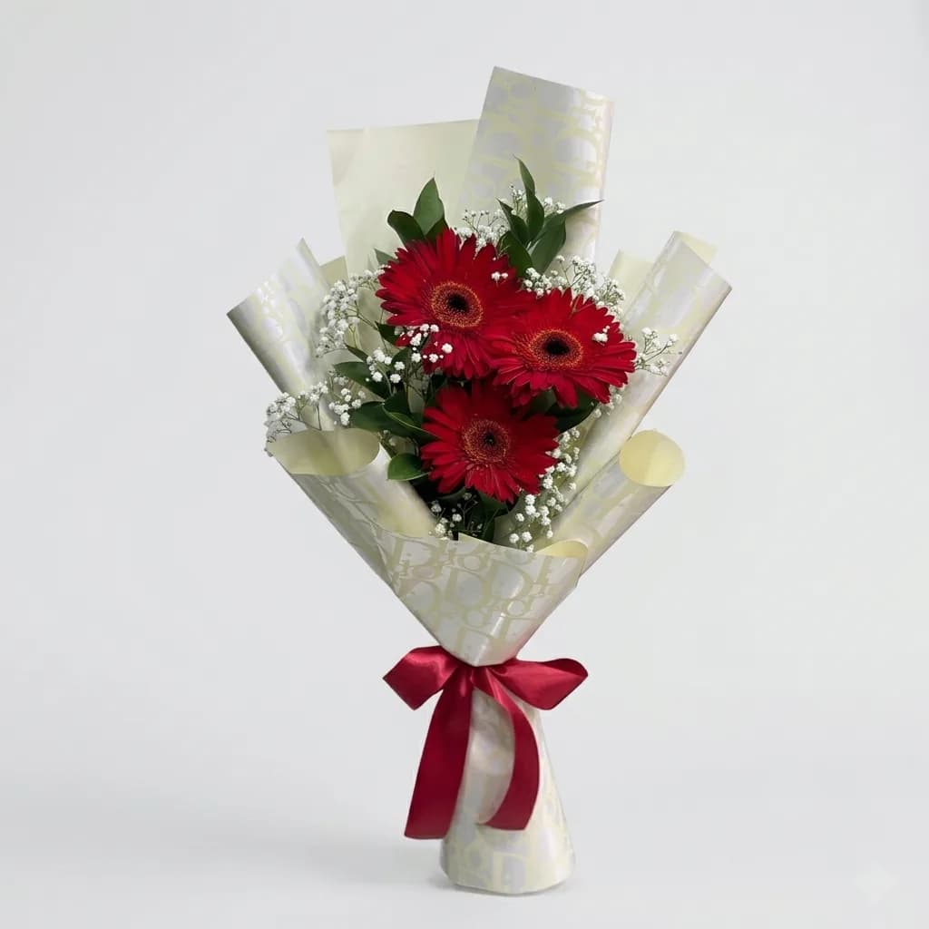 Red Gerberas with Baby's Breath image