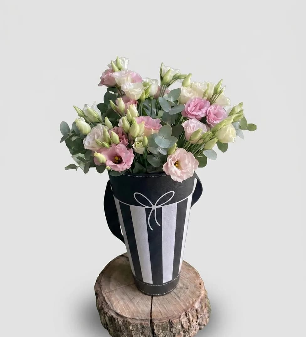Elegant Floral Arrangement in a Black and White Box image